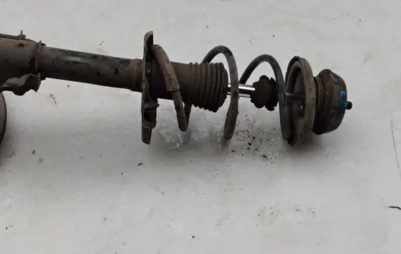 Dacia Logan II Front shock absorber with coil spring