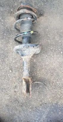 Subaru Legacy Front shock absorber with coil spring