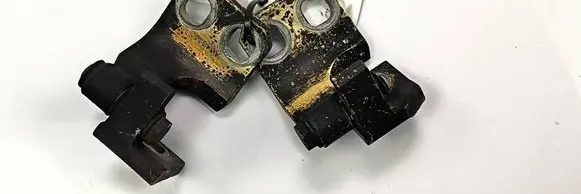 Front door check strap stopper