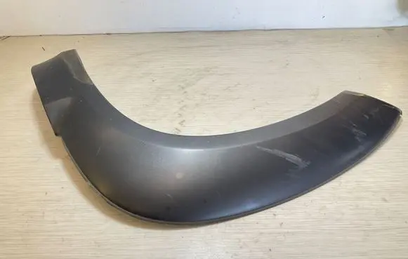 Hyundai Tucson JM Front arch trim 