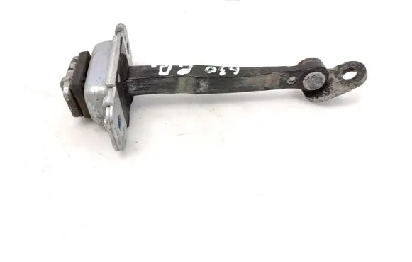 Front door check strap stopper