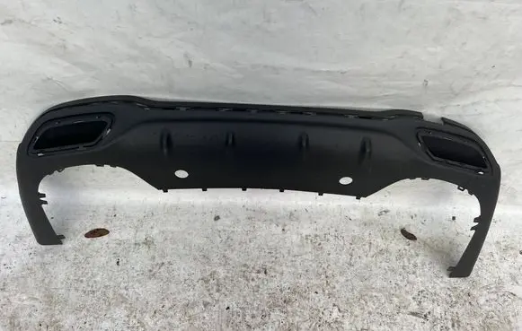 Rear bumper trim bar molding