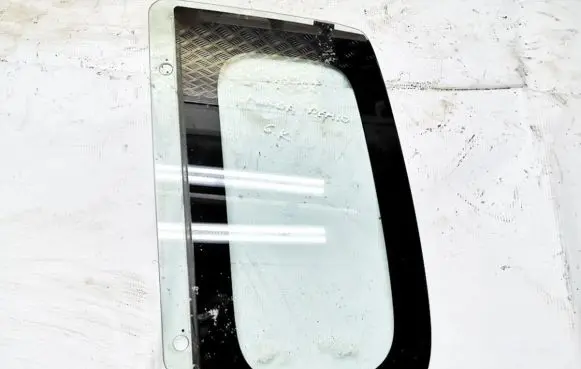 Mazda Demio Rear side window