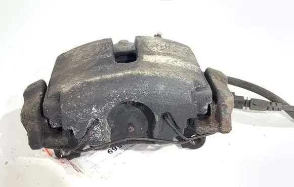 Volkswagen PASSAT B7 Front brake caliper 