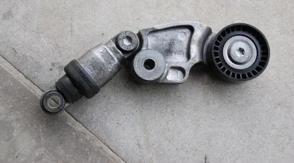 Timing belt tensioner pulley