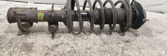 Front shock absorber with coil spring