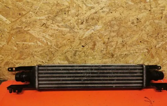 Opel Corsa D Intercooler radiator 55702004