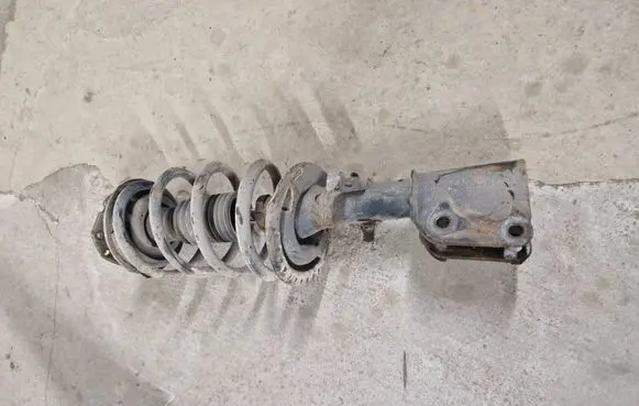 Front shock absorber with coil spring