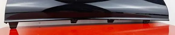 Rear bumper trim bar molding