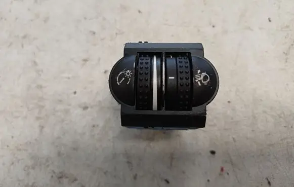 Volkswagen Touareg I Headlight level height control switch 7L6941333D