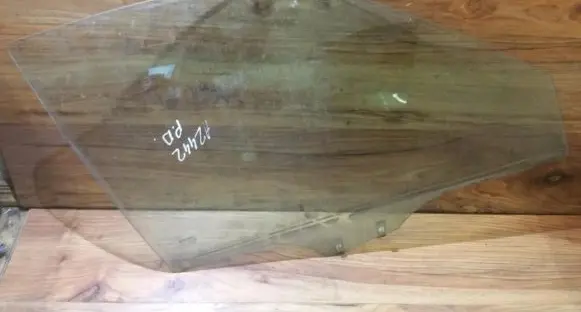 Mazda 323 F Front door window glass four-door