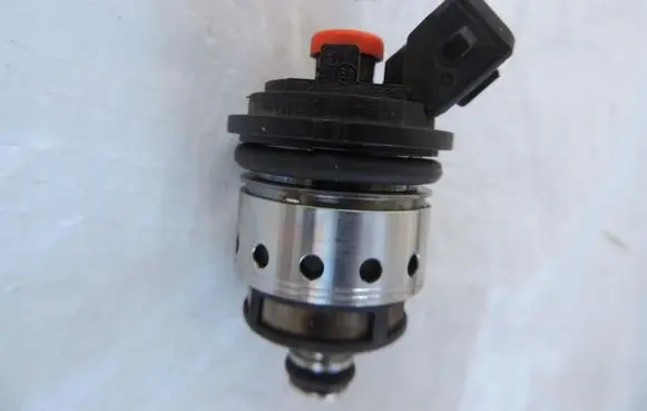 Opel Astra J Fuel injector 9255413