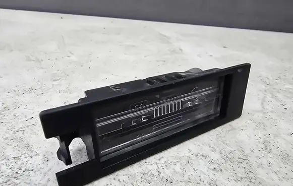 Opel Astra H Number plate light 13139990