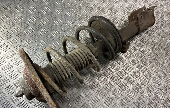 Front shock absorber with coil spring