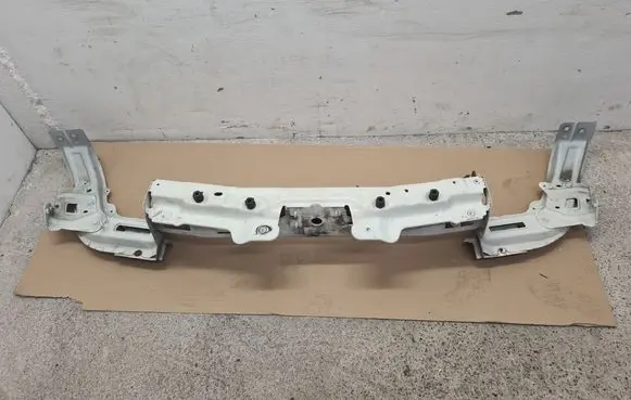 Top upper radiator support slam panel