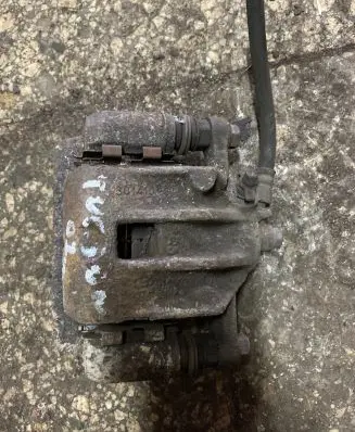 Hyundai Tucson JM Front brake caliper
