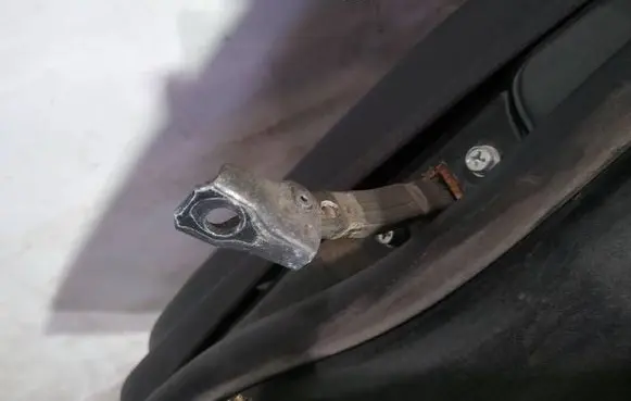 Mitsubishi Lancer X Rear door check strap stopper