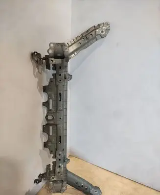 Top upper radiator support slam panel
