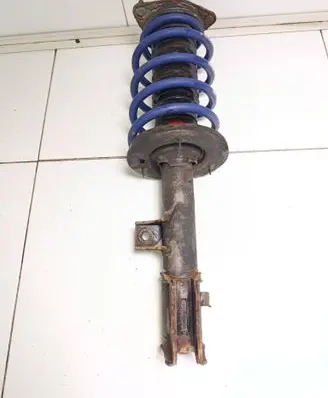 KIA Sportage Front shock absorber with coil spring 546503U000
