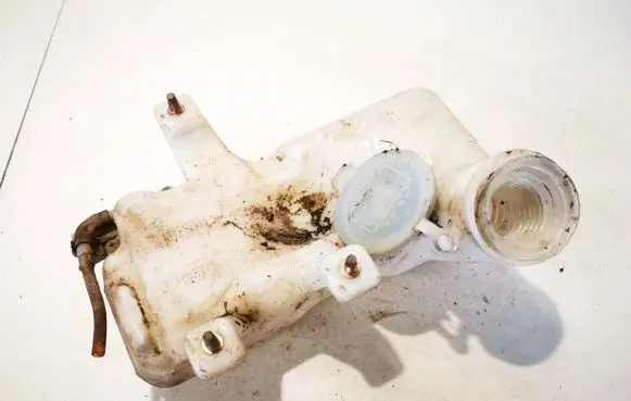 Mazda 626 Windshield washer fluid reservoir/tank 860141219 860141-219