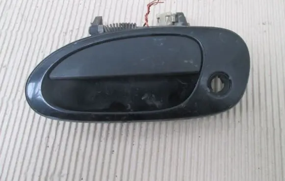 Mazda 323 F Front door exterior handle
