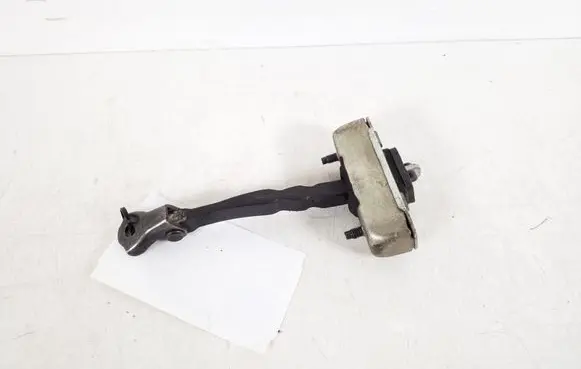 Front door check strap stopper