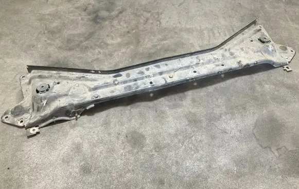 Radiator support slam panel