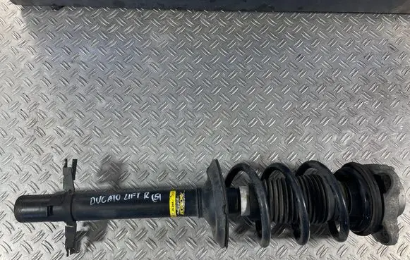 Front shock absorber with coil spring
