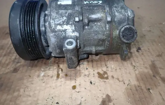 Opel Corsa D Air conditioning (A/C) compressor (pump) 55701200 5E5275200