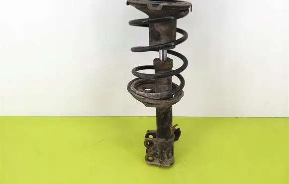 Toyota Avensis T220 Front shock absorber with coil spring 