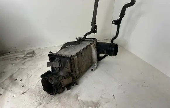Volkswagen Golf VII Intercooler radiator 04E145785