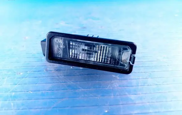 Volkswagen PASSAT B7 Number plate light 1K8943021