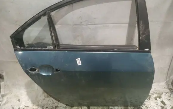 Nissan Primera Rear door MELYNOS