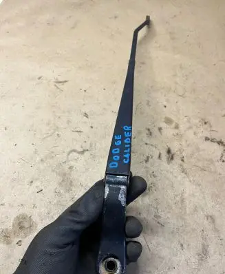 Front wiper blade arm