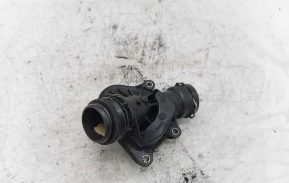 Thermostat/thermostat housing