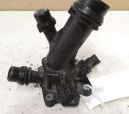 Thermostat/thermostat housing