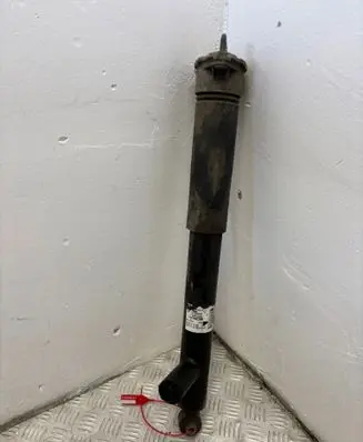 Mercedes-Benz E C207 W207 Front shock absorber with coil spring