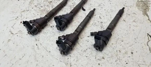 Saab 9-3 Ver2 Fuel injectors set 04451100299