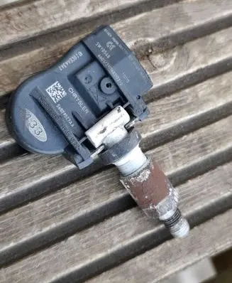 Chrysler Voyager Tire pressure sensor 56029527AA