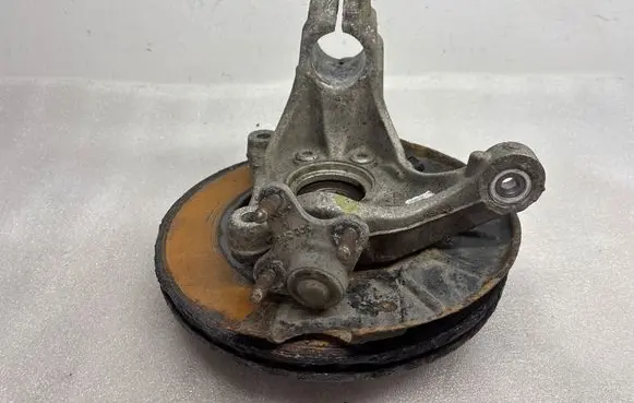 Front wheel hub spindle knuckle