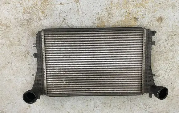 Volkswagen Touran I Intercooler radiator 1K0145803T