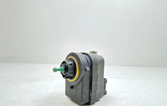 Renault Scenic I Headlight level adjustment motor T7706840141
