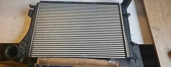 Volkswagen Touran I Intercooler radiator 1K0145803H