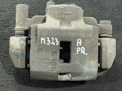 Mazda 323 F Front brake caliper