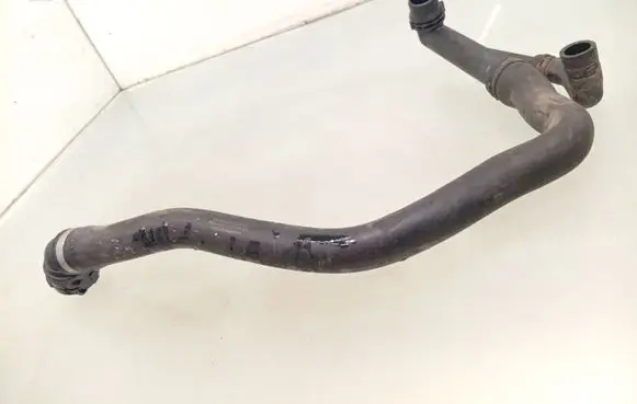 Volkswagen Golf VII Engine coolant pipe/hose 5Q0121619B