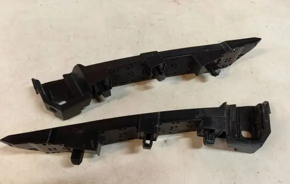 Front bumper mounting bracket