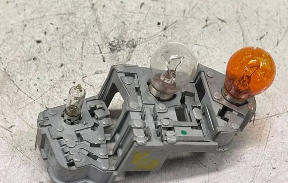 Volvo V60 Tail light bulb cover holder 21429002