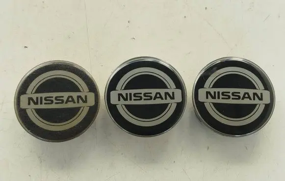 Nissan Primera Original wheel cap EC11