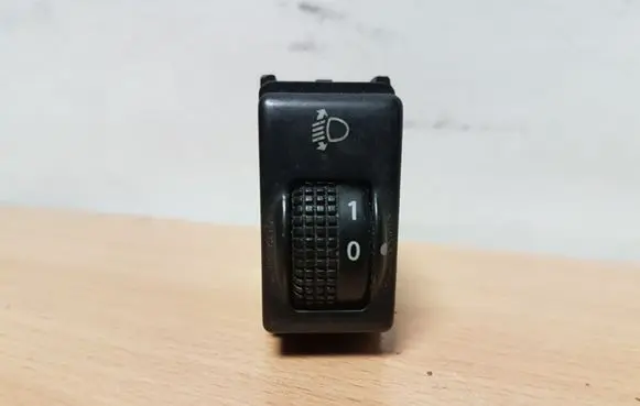 Headlight level height control switch