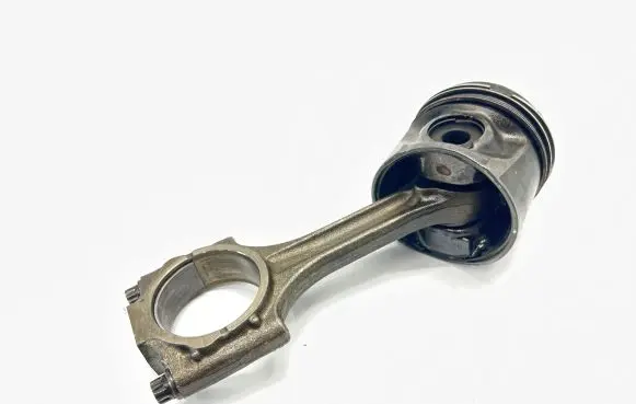 Piston with connecting rod